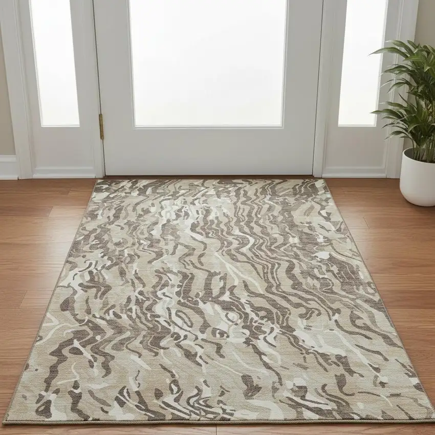 Beige Taupe And Ivory Abstract Washable Area Rug With UV Protection Photo 2