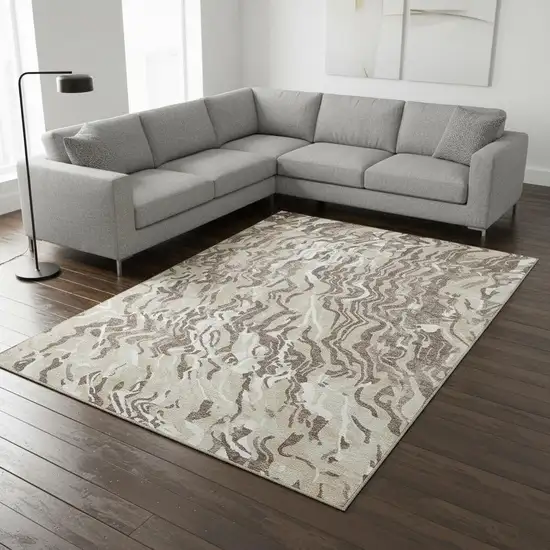 Beige Taupe And Ivory Abstract Washable Area Rug With UV Protection Photo 2