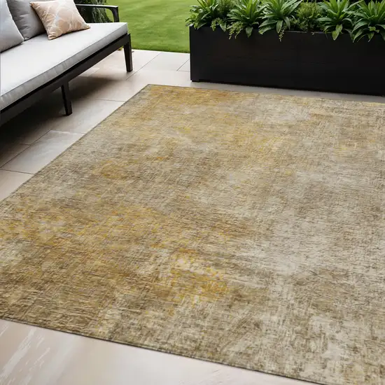 Beige Taupe And Ivory Abstract Washable Indoor Outdoor Area Rug Photo 1