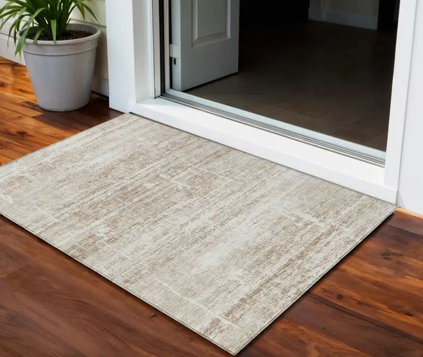 Beige Taupe And Ivory Abstract Washable Indoor Outdoor Area Rug Photo 1