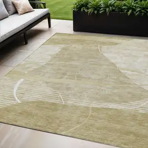 Photo of Beige Taupe And Tan Abstract Washable Indoor Outdoor Area Rug