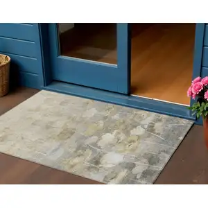 Photo of Beige Taupe And Wheat Floral Washable Indoor Outdoor Area Rug