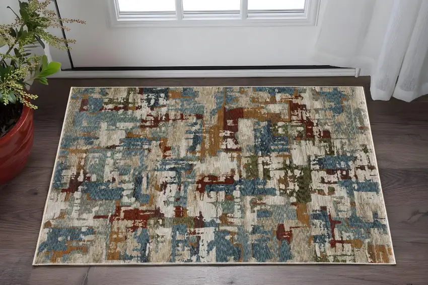 Beige Teal And Brown Abstract Area Rug With Fringe Photo 1