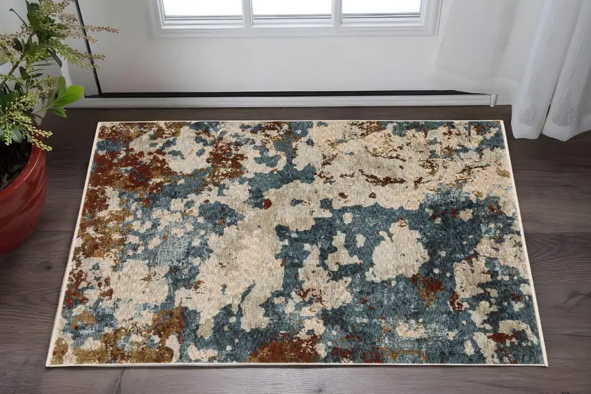 Beige Teal And Rust Abstract Area Rug With Fringe Photo 1