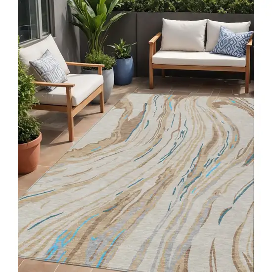 Beige Teal Blue And Ivory Abstract Washable Indoor Outdoor Area Rug Photo 1