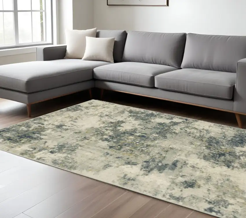 Beige And Ivory Abstract Area Rug Photo 1