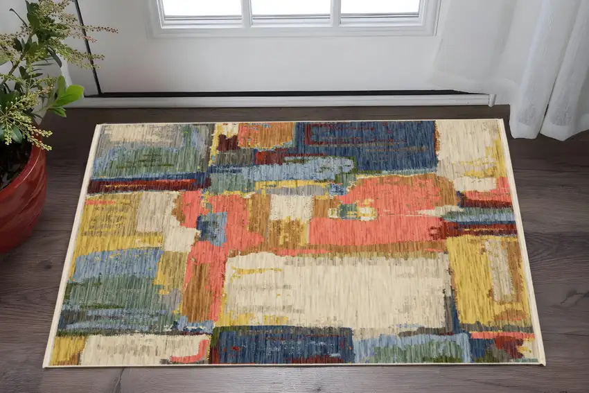 Beige Yellow And Pink Abstract Area Rug With Fringe Photo 1