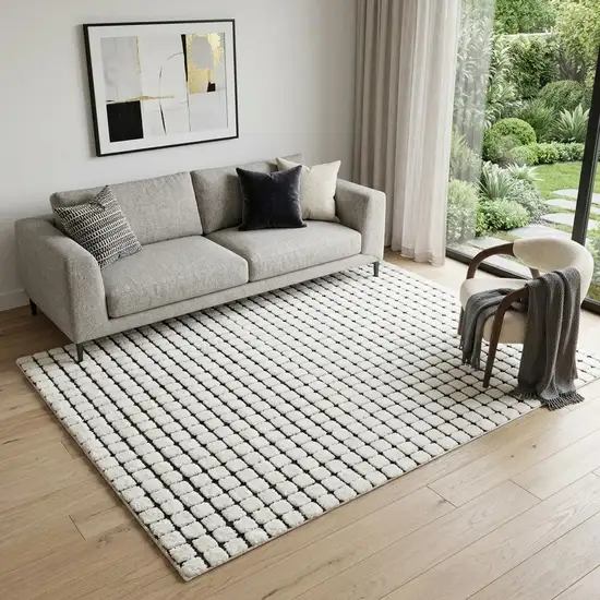 Beige and Black Checkered Power Loom Distressed Area Rug Photo 1