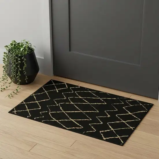 Beige And Black Floral Distressed Area Rug Photo 1