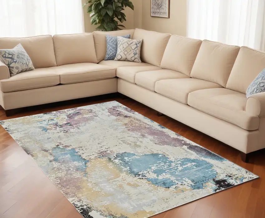 Beige and Blue Abstract Distressed Area Rug Photo 1