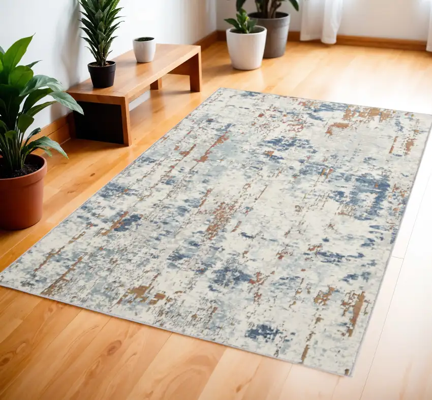 Beige and Blue Abstract Power Loom Area Rug Photo 1