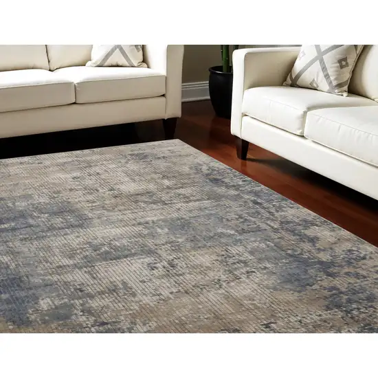 Beige and Blue Abstract Power Loom Distressed Area Rug Photo 1