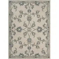 Photo of Beige and Blue Filigree Area Rug