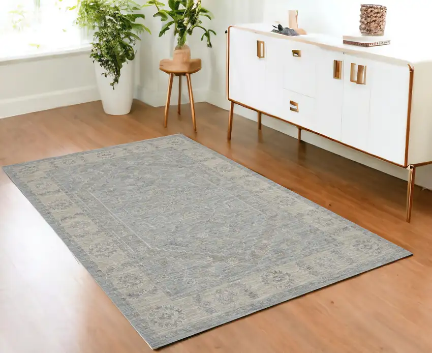 Beige and Blue Floral Power Loom Area Rug Photo 1