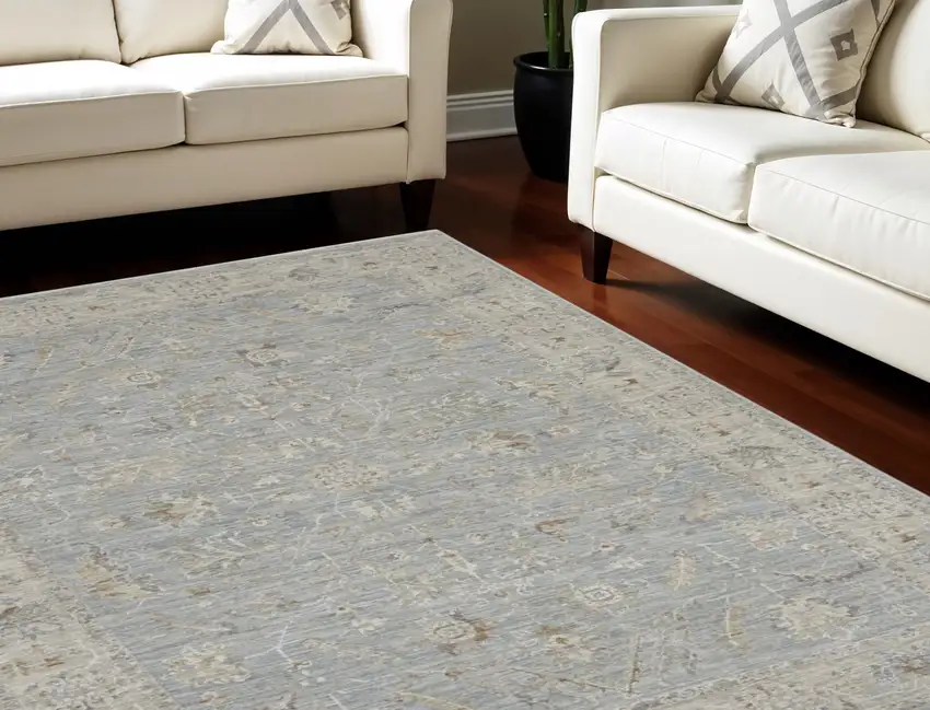 Beige and Blue Floral Power Loom Area Rug Photo 1
