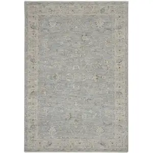 Photo of Beige and Blue Floral Power Loom Area Rug