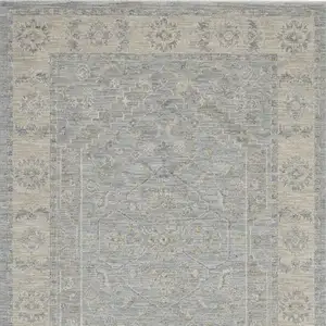Photo of Beige and Blue Floral Power Loom Area Rug