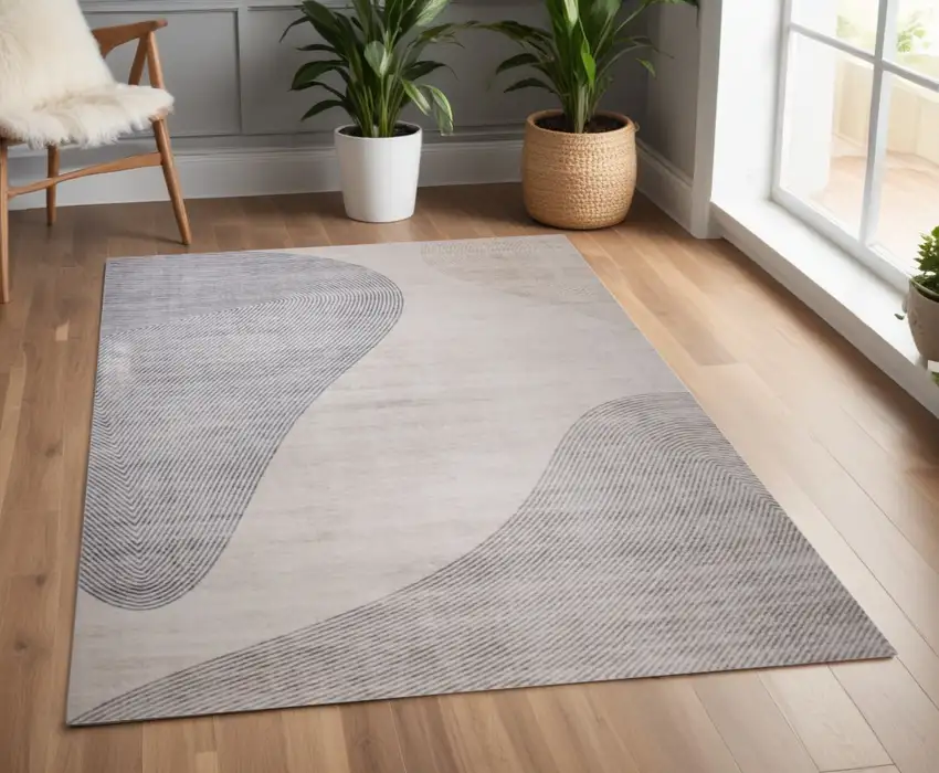 Beige and Brown Abstract Area Rug Photo 1