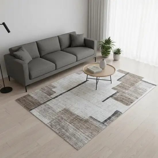 Beige and Brown Abstract Area Rug Photo 1