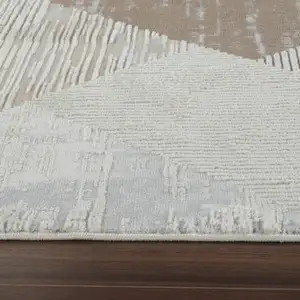 Photo of Beige and Brown Abstract Distressed Area Rug