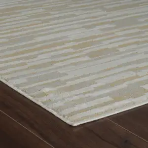 Photo of Beige and Brown Abstract Distressed Area Rug