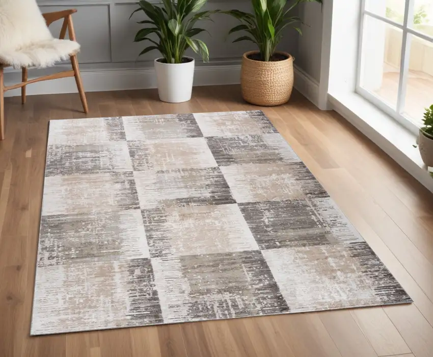 Beige and Brown Abstract Distressed Area Rug Photo 1