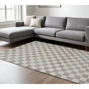 Photo of Beige and Brown Checkered Power Loom Area Rug
