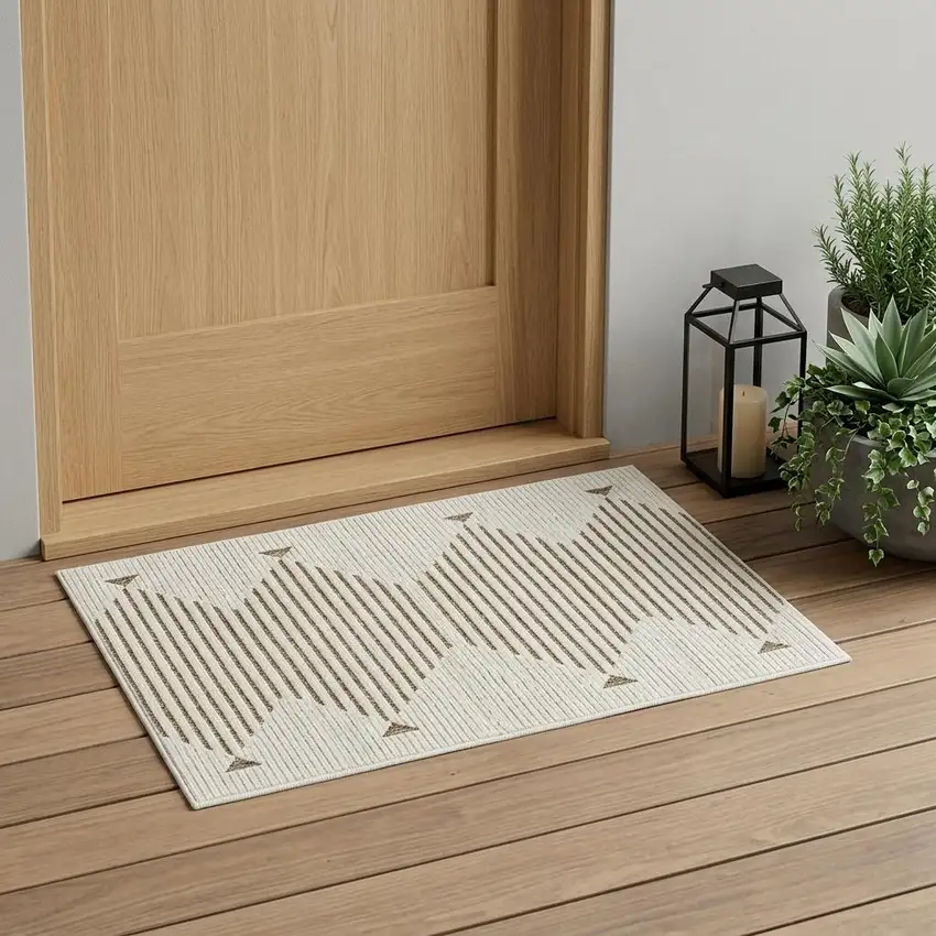 Beige and Brown Geometric Distressed Indoor Outdoor Area Rug Photo 1