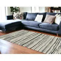 Photo of Beige and Gray Abstract Area Rug
