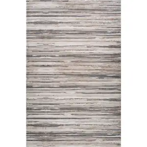 Photo of Beige and Gray Abstract Distressed Area Rug