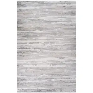 Photo of Beige and Gray Abstract Worn Faded Area Rug