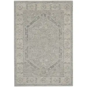 Photo of Beige and Gray Floral Medallion Power Loom Area Rug