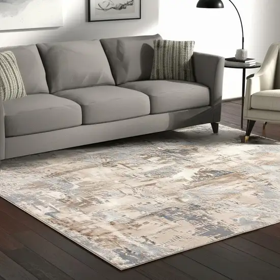 Beige And Ivory Abstract Area Rug Photo 1