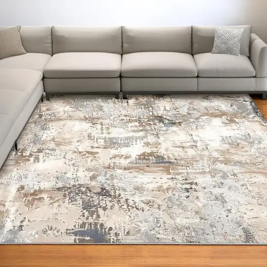 Beige And Ivory Abstract Area Rug Photo 1