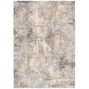 Photo of Beige and Ivory Abstract Area Rug