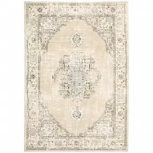 Photo of Beige and Ivory Center Jewel  Area Rug
