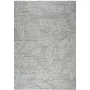 Photo of Beige and Ivory Floral Distressed Area Rug