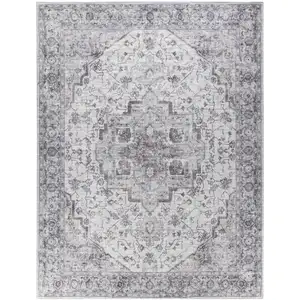 Photo of Beige and Ivory Floral Power Loom Distressed Washable Area Rug