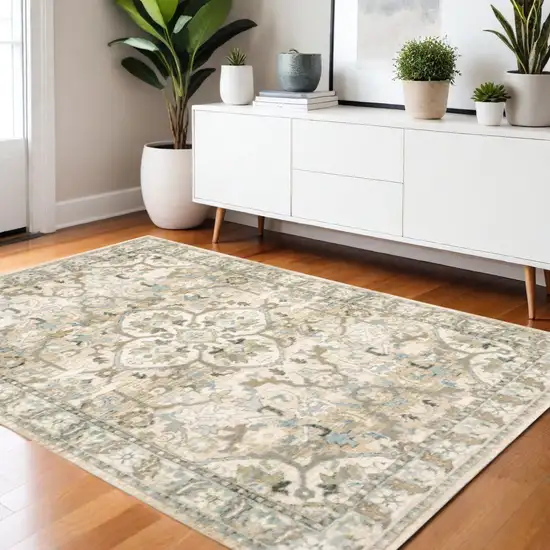 Beige And Ivory Medallion Area Rug Photo 1