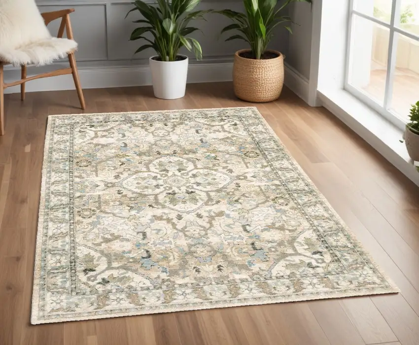 Beige And Ivory Medallion Area Rug Photo 1