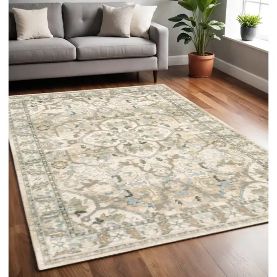 Beige And Ivory Medallion Area Rug Photo 1