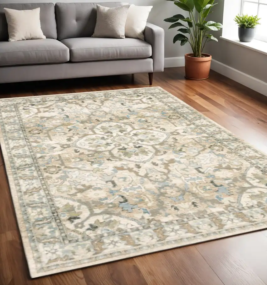 Beige And Ivory Medallion Area Rug Photo 1
