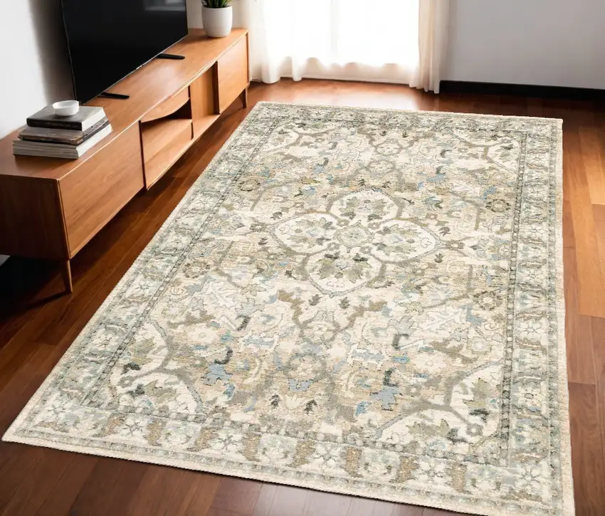 Beige And Ivory Medallion Area Rug Photo 1