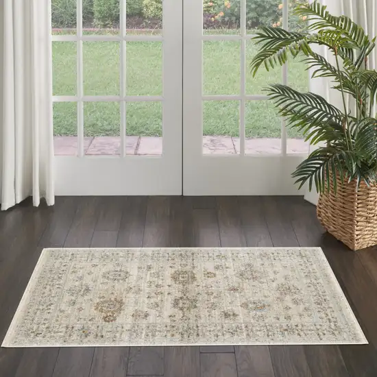 Beige and Ivory Oriental Power Loom Distressed Area Rug With Fringe Photo 3