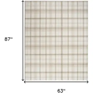 Photo of Beige and Ivory Plaid Power Loom Area Rug