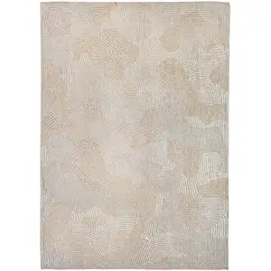 Photo of Beige and White Abstract Non Skid Area Rug