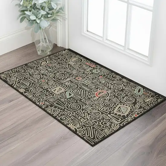 Black And Beige Abstract Area Rug Photo 1