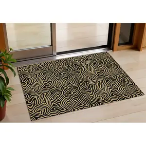 Photo of Black And Beige Abstract Washable Indoor Outdoor Area Rug