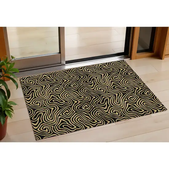 Black And Beige Abstract Washable Indoor Outdoor Area Rug Photo 1