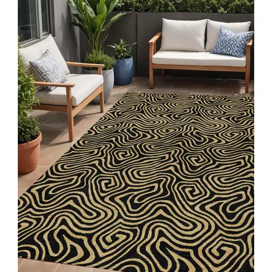 Black And Beige Abstract Washable Indoor Outdoor Area Rug Photo 1
